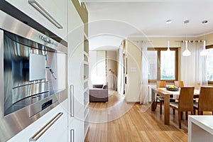 Fitted coffee machine in a modern kitchen