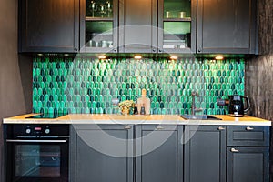 Fitted kitchen in small elegant apartment