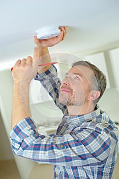 Fitting fire alarm to be safe