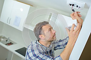 Fitting smoke alarm in home