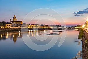 Fiume Arno river Florence Italy at night