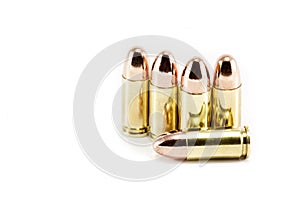 Five 9mm bullets photo