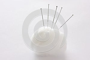 Five acupuncture needles in cotton wool