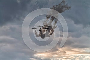 Five airplanes formation at an air show