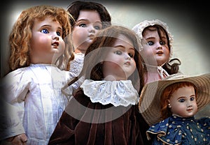 Five antique dolls photo