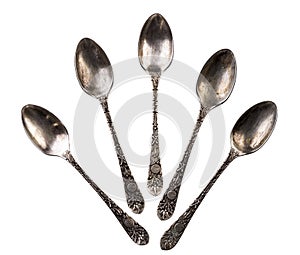 Five antique teaspoons
