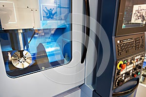 Five-axis machining center with CNC photo