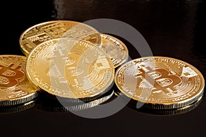 Bitcoin coins on black background