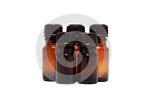Five bottles of aromatherapy oils isolated