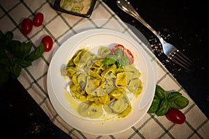 Five Cheeses ravioli with pesto