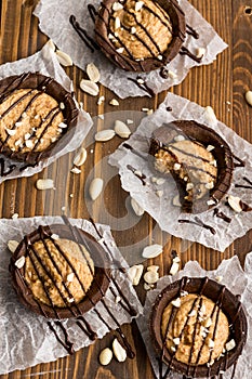 Five chocolate striped buscuits and peanuts