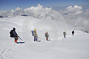 Five climbers trekking down