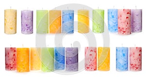 Five color wax candles on white