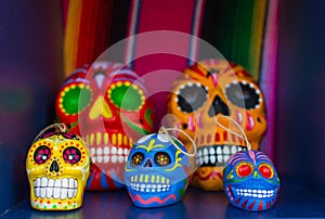 Five colorful skulls from Mexican tradition