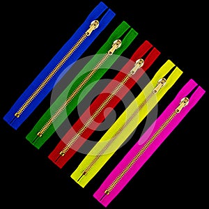 Five colorful zipper closures