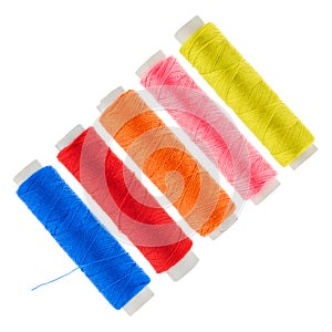Five coloured linen thread roles