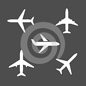Five different airplane silhouette icons