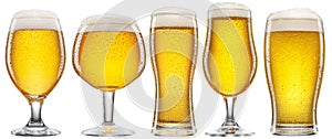 Five different glasses with light beer and with drops on the surface isolated on a white background. Beer concept. Clipping path