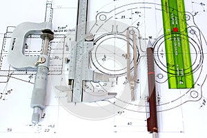 Five engineering tools on blueprint