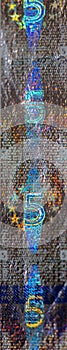 Holograms security features on 5 euro banknote