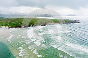 Five Finger Strand, one of the most famous beaches in Inishowen known for its pristine sand and rocky coastline with some of the