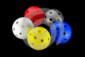 Five floorball balls isolated