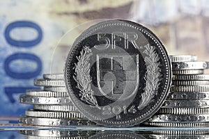 Five franc coin and other Swiss money