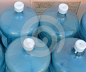 Five gallon water jugs outdoors