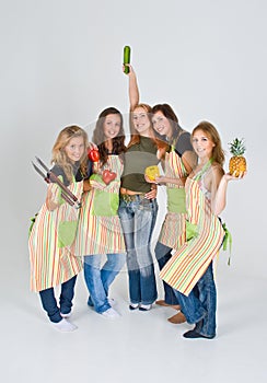 Five happy female cooks