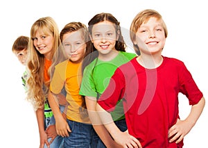 Five happy kids in colorful shirts