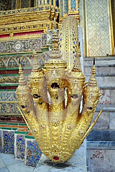 Five headed NÄga serpent guarding building entrance in Wat Phra Kaew, Bangkok