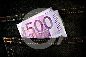 Five hundred euros banknote in the pocket of jeans.