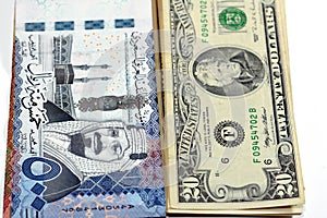 Five hundred Saudi Arabia riyals cash money banknote 500 SAR features king AbdulAziz Al Saud and Kabaa with 20 $ Twenty American