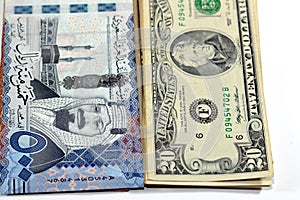 Five hundred Saudi Arabia riyals cash money banknote 500 SAR features king AbdulAziz Al Saud and Kabaa with 20 $ Twenty American photo