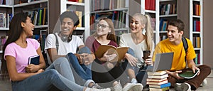 Five international students having good time at university library