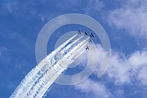 Five jet combat training aircraft in the sky