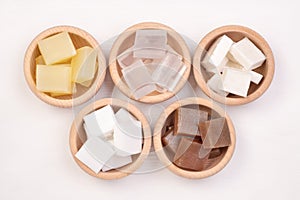 Five kinds of glycerin soap bases in wooden bowls