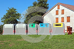 five large bins for separate waste collection