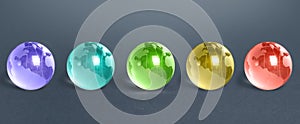 Five multicolored glass globes of planet earth. Globalization and markets. Future forecasts world development. Preservation