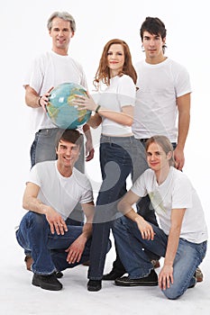 Five people with a globe