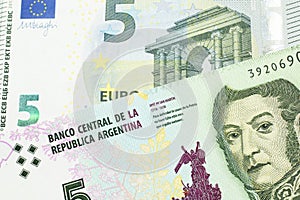 A peso note from Argentina, close up with a European, euro bill photo