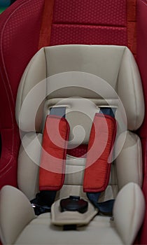 Five point seat belt carseat in red color tone