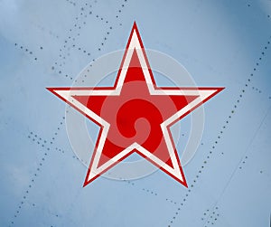 Five-pointed red star on the wing skin of a military fighter