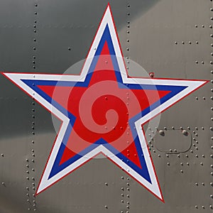 Five-pointed star as emblem of the modern Russian army aboard a military helicopter