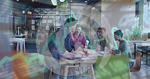 Five professionals in suits collaborating around table in office, with documents and sticky notes