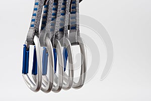 Five quick draws, carabiners with straight gate on white background