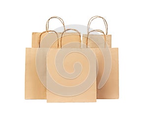 Five Recycled paper shopping bags isolated on white background