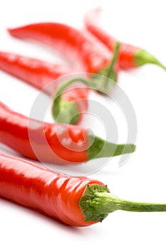 Five red chili peppers