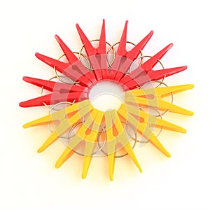 Five red and five yellow pegs situated around