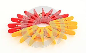 Five red and five yellow pegs situated around